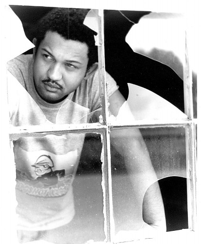 Mike peers through a broken window in Selmer, Tennessee. Mike peers through a broken window in Selmer, Tennessee.