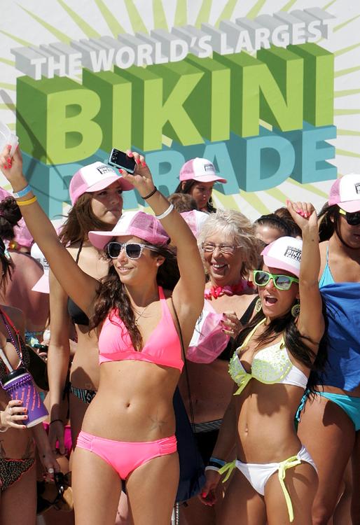 Women get ready for the bikini parade in Panama City Beach