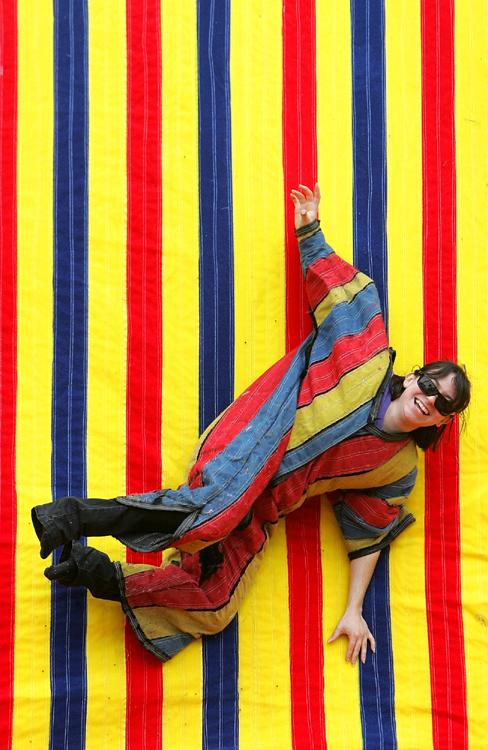 Leslie Perez enjoys the Velcro wall during a carnival at Gulf Coast State College in Panama City, Florida.